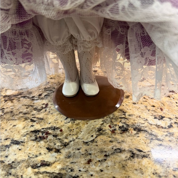 Vintage 16” Porcelain Doll with purple dress and blonde hair, blue eyes. - Picture 6 of 6